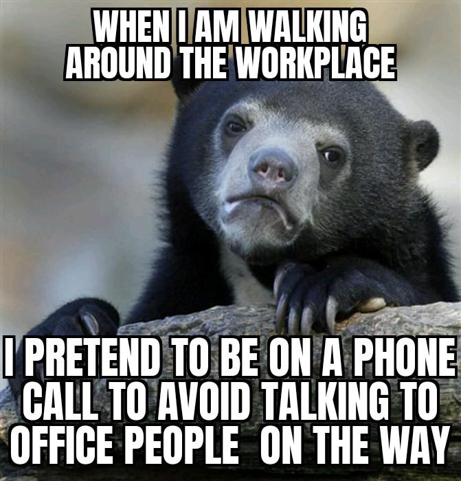 Open bear pretending phone call