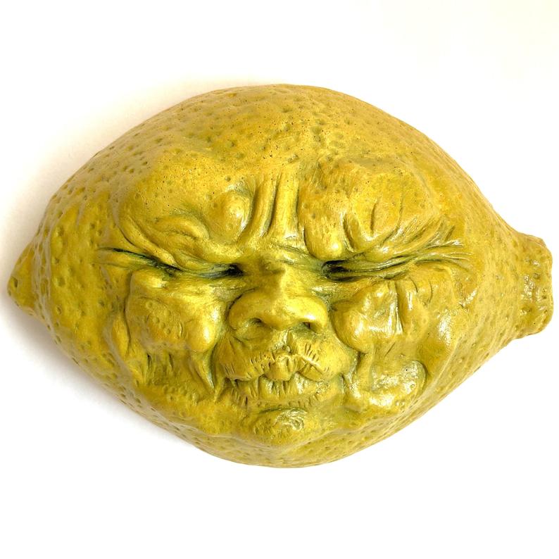Open sour lemon face