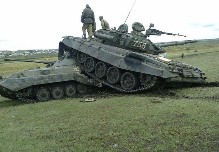 Open tanks holding position